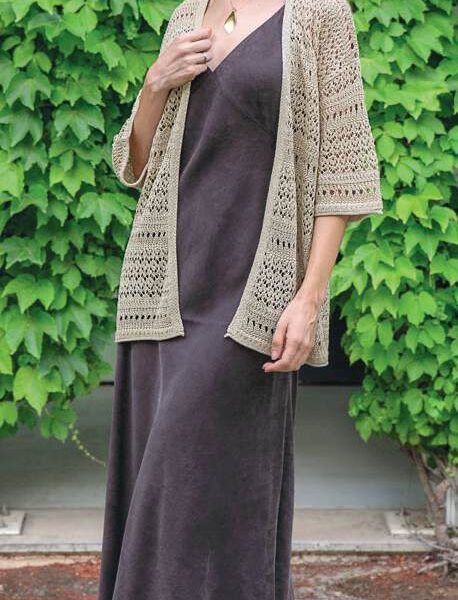 Chaqueta punto larga calada Trípode